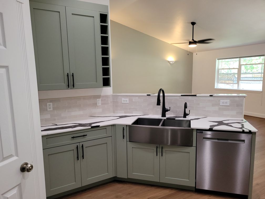 07 Kitchen View of Sink, Backsplash, & Pony Wall